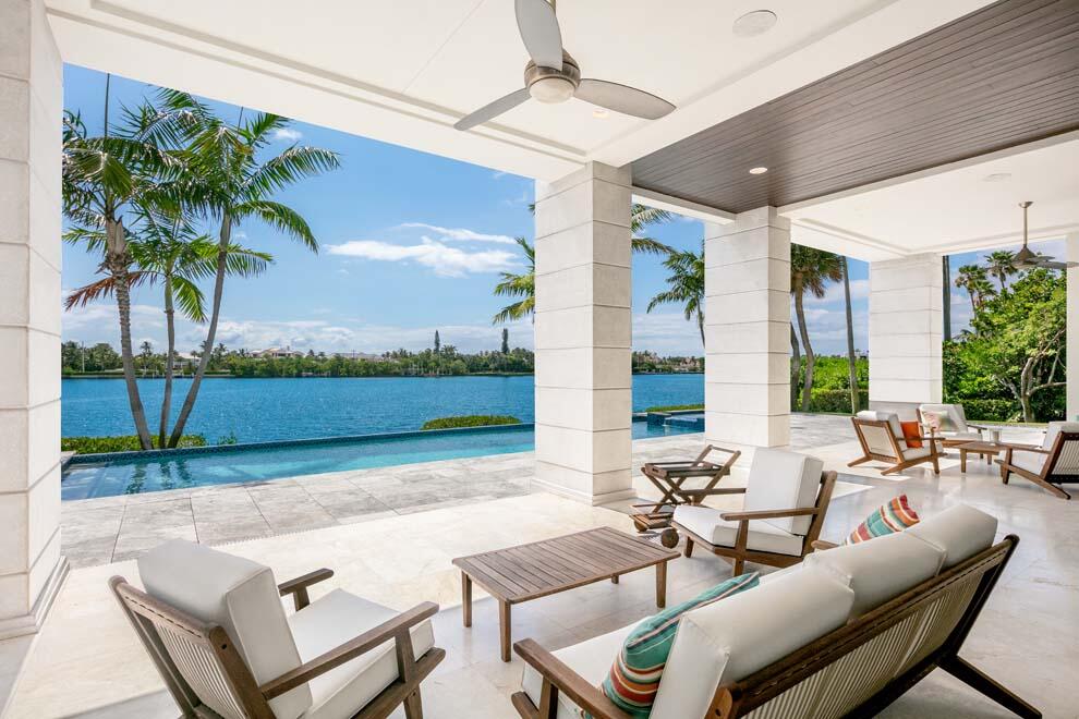 1540 Paslay Place Manalapan, FL 33462 - Photo 30 of 40 a building outdoor space with patio furniture