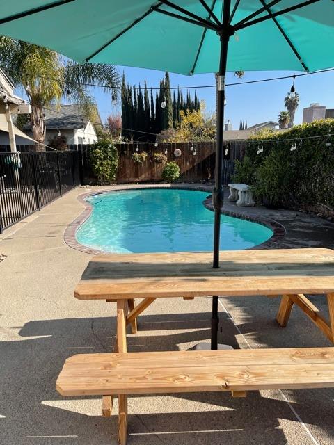 2212 Lavon Lane Ceres, CA 95307 - Photo 11 of 14 a view of swimming pool with a patio