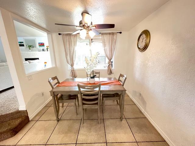 2212 Lavon Lane Ceres, CA 95307 - Photo 6 of 14 a view of a dining room with furniture and a chandelier