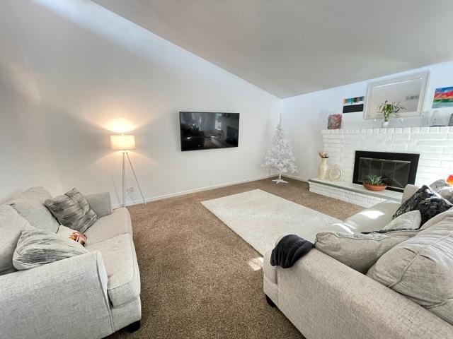 2212 Lavon Lane Ceres, CA 95307 - Photo 7 of 14 a living room with furniture and a flat screen tv