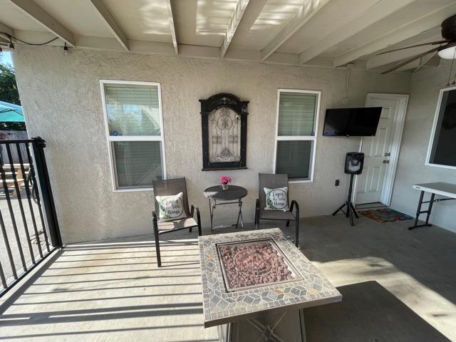 2212 Lavon Lane Ceres, CA 95307 - Photo 8 of 14 a living room with furniture and a wooden floor