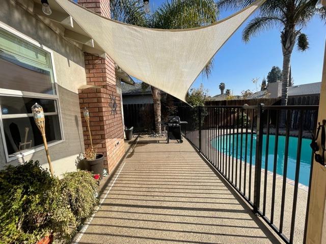 2212 Lavon Lane Ceres, CA 95307 - Photo 9 of 14 a view of balcony with wooden floor and seating space