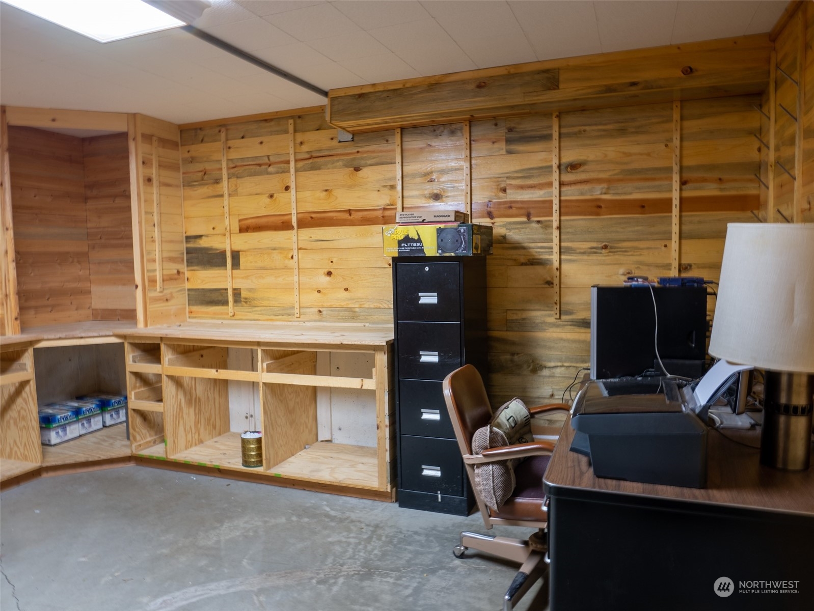 22 Rhinehart Road Winthrop, WA 98862 - Photo 13 of 23 a view of workspace with wooden floor and windows