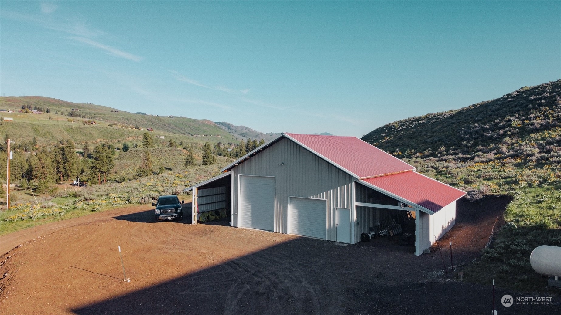 22 Rhinehart Road Winthrop, WA 98862 - Photo 14 of 23 a view of a house with a mountain view