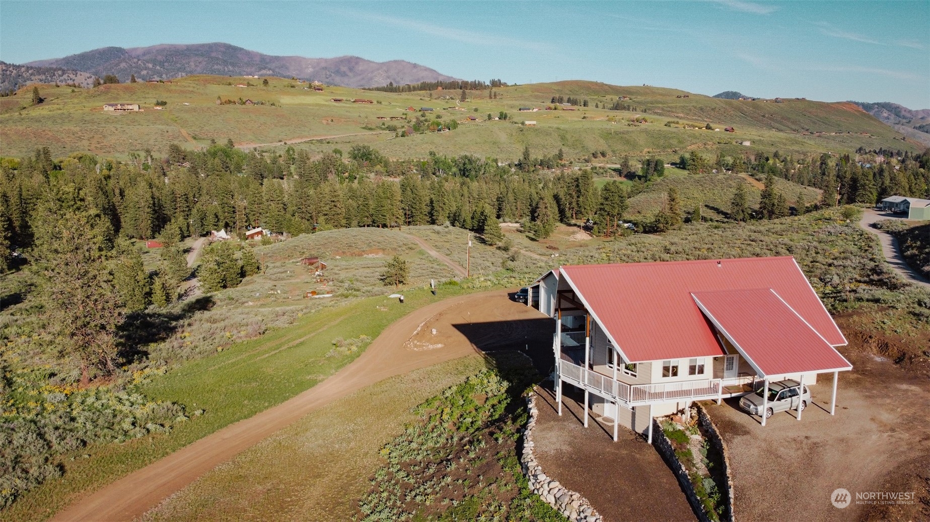 22 Rhinehart Road Winthrop, WA 98862 - Photo 17 of 23 a view of a terrace with a mountain