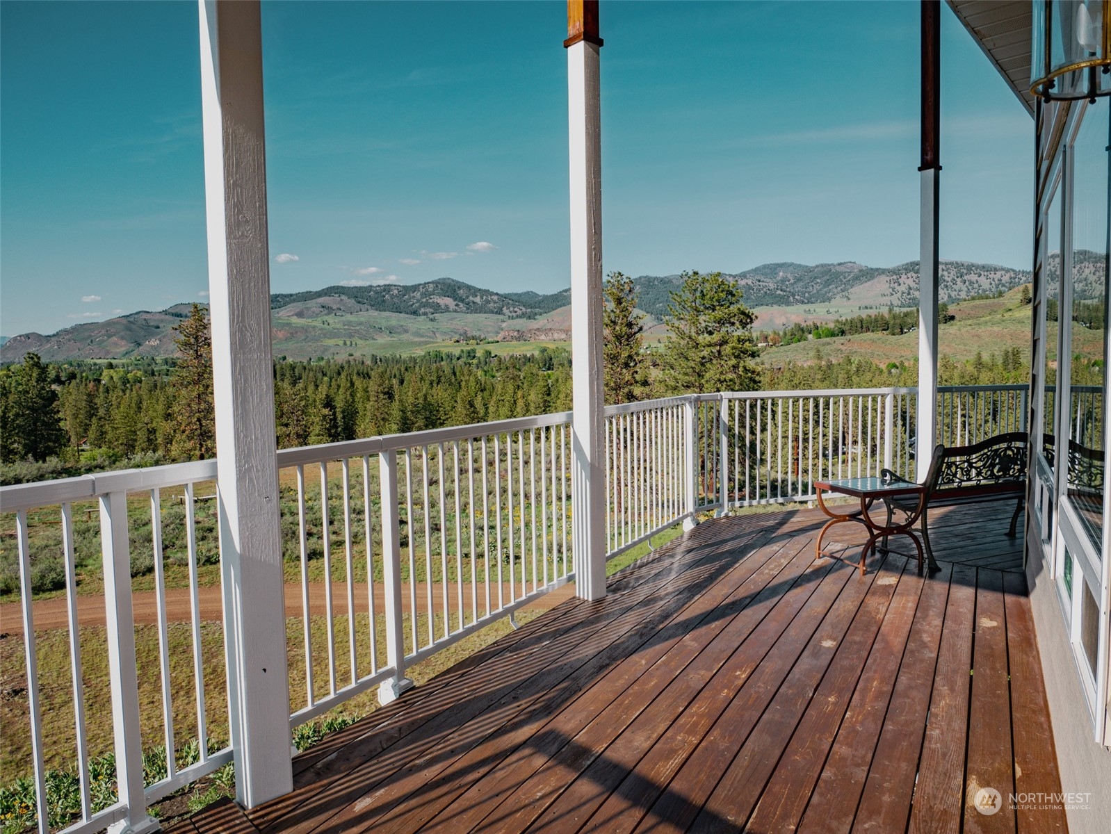 22 Rhinehart Road Winthrop, WA 98862 - Photo 19 of 23 a view of balcony with wooden floor