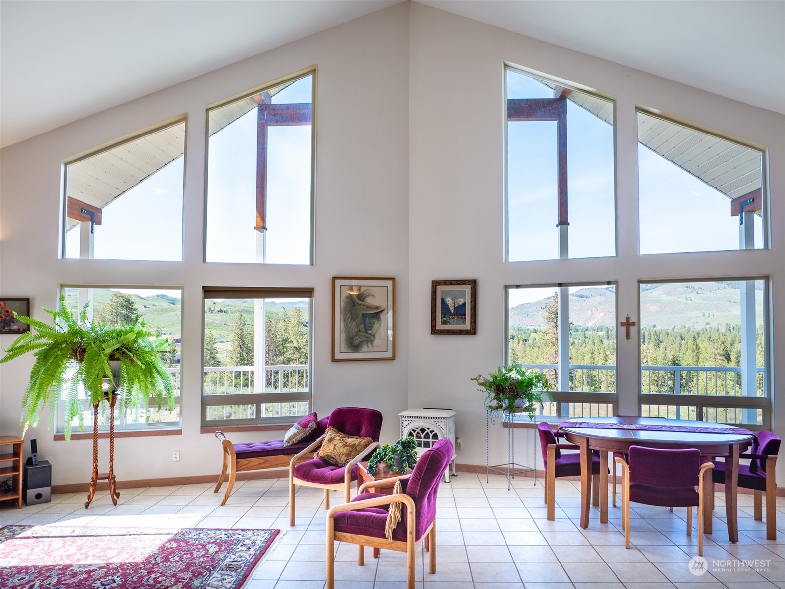 22 Rhinehart Road Winthrop, WA 98862 - Photo 4 of 23 a living room with furniture and floor to ceiling windows
