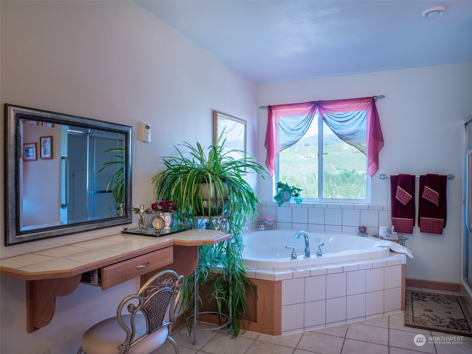 22 Rhinehart Road Winthrop, WA 98862 - Photo 10 of 23 a living room with furniture and a potted plant
