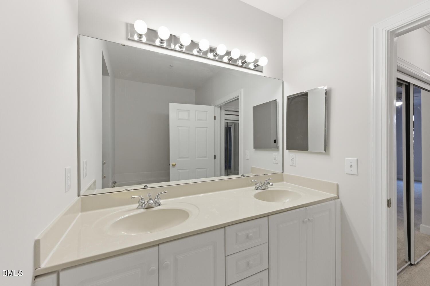 116 Northbrook Drive, Unit 204 Raleigh, NC 27609 - Photo 34 of 94 a bathroom with a sink and a mirror
