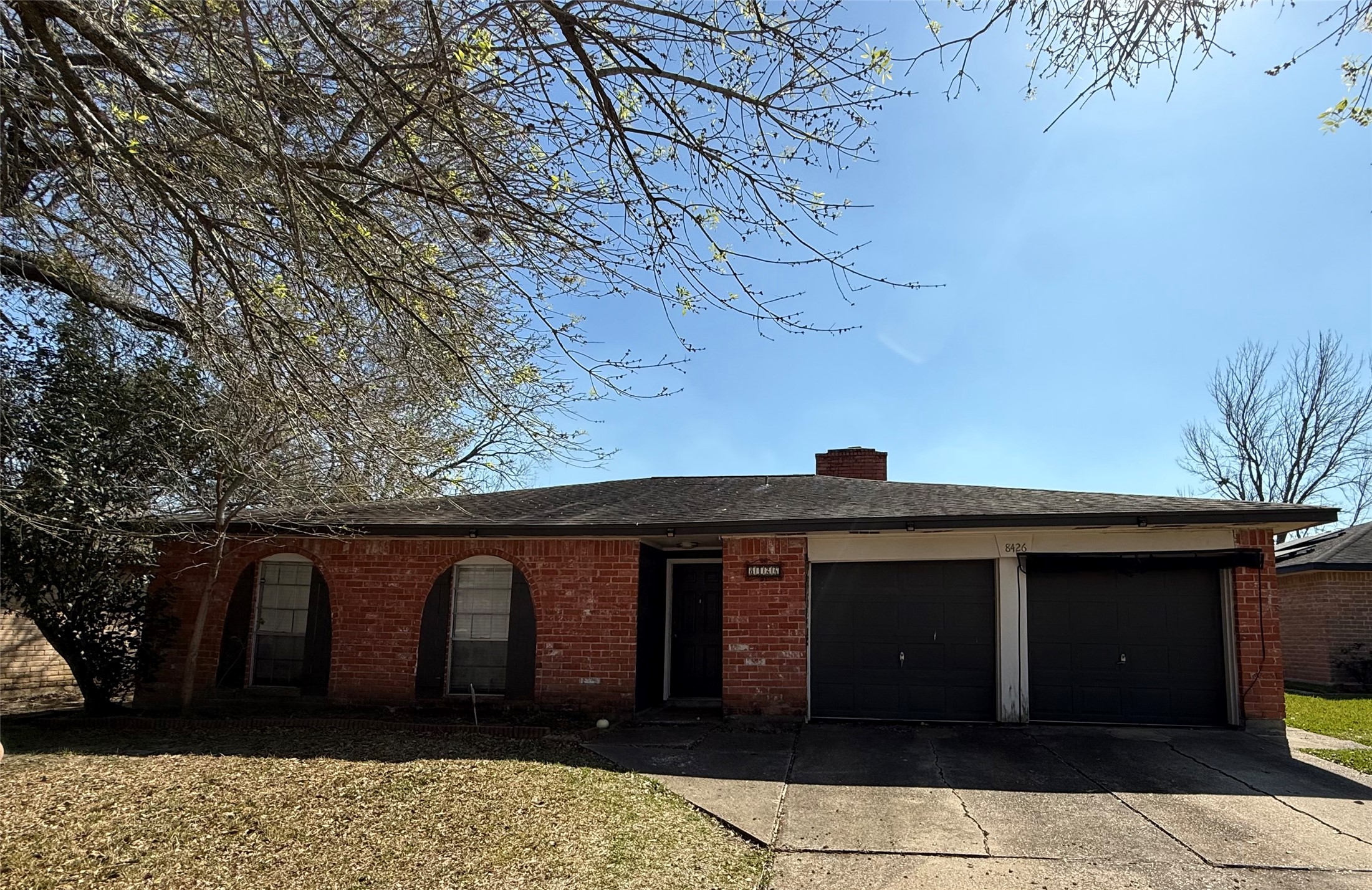 8426 Avington Road La Porte, TX 77571 - Photo 1 of 8 a front view of a house with a yard
