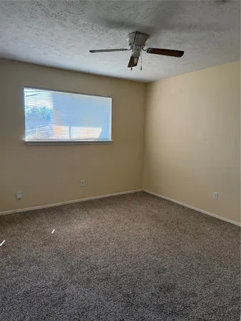 a view of a window in an empty room