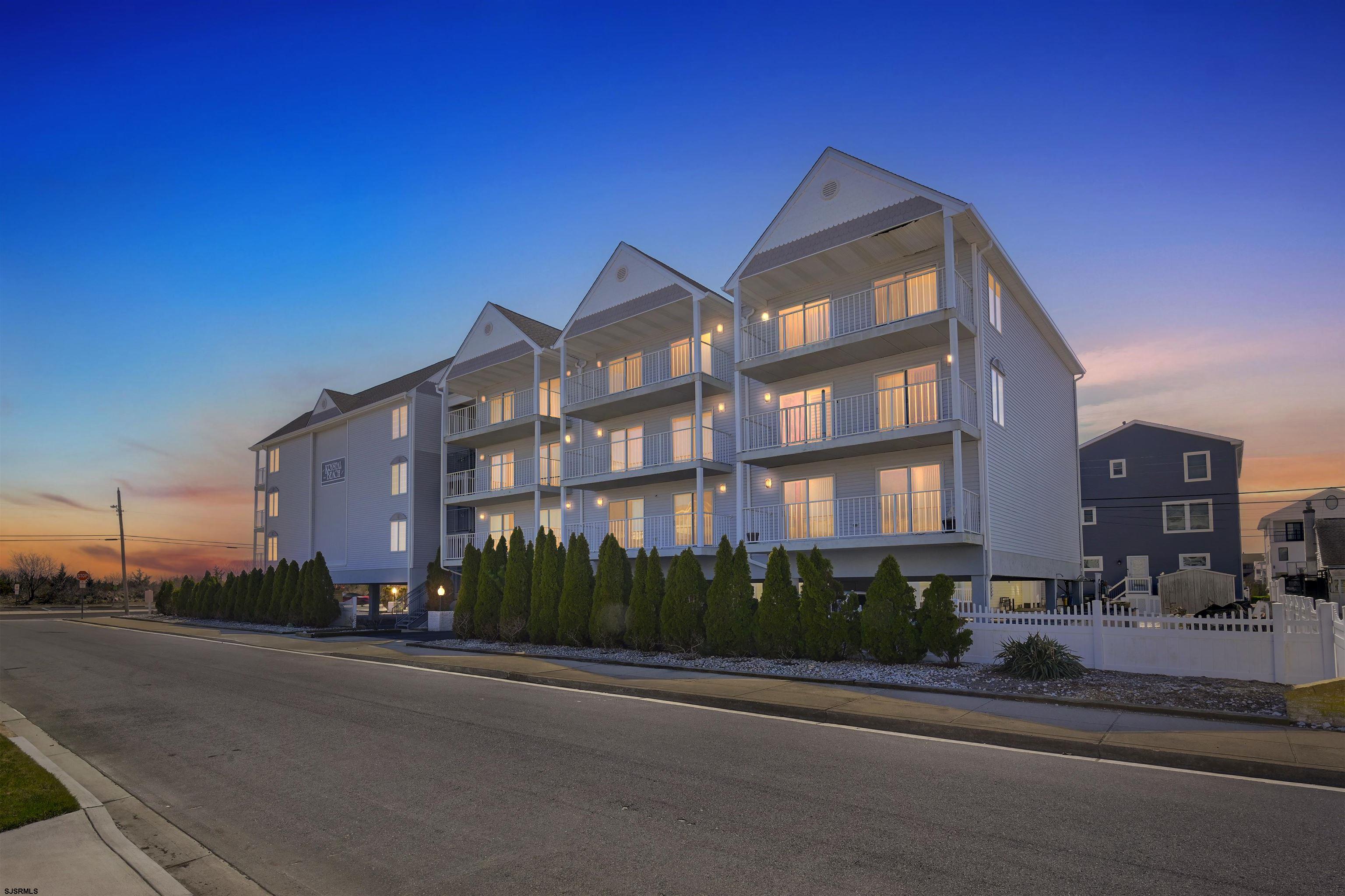 3901 Ocean Avenue, Unit 6 Brigantine, NJ 08203 - Photo 16 of 24 a street view along with residential houses
