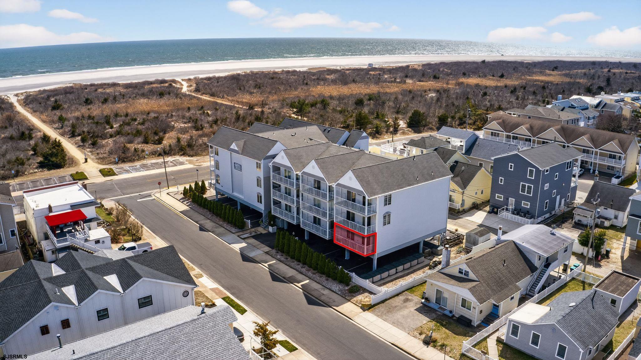 3901 Ocean Avenue, Unit 6 Brigantine, NJ 08203 - Photo 18 of 24 an aerial view of a houses with a city street