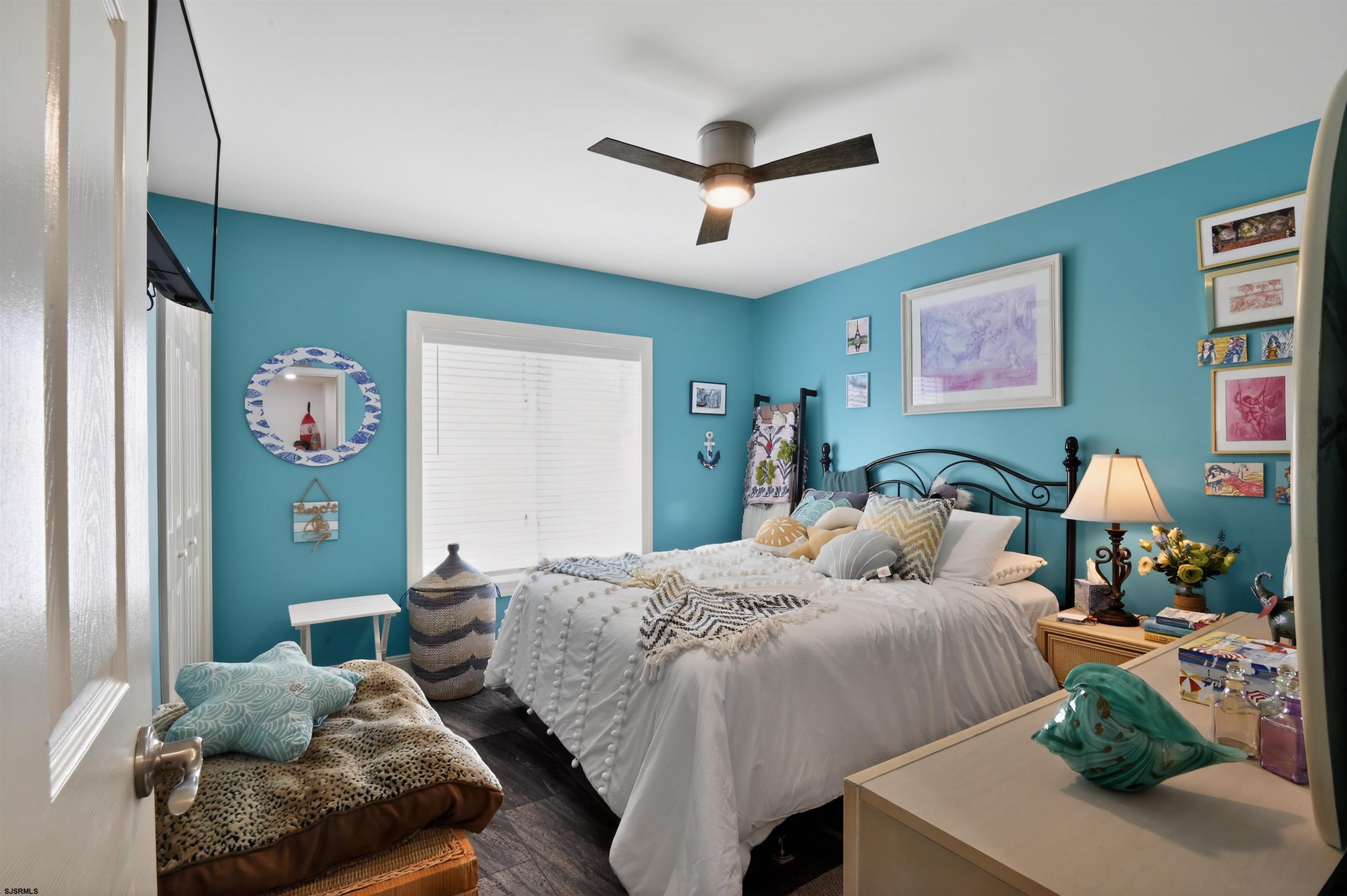3901 Ocean Avenue, Unit 6 Brigantine, NJ 08203 - Photo 9 of 24 a bedroom with a bed and window