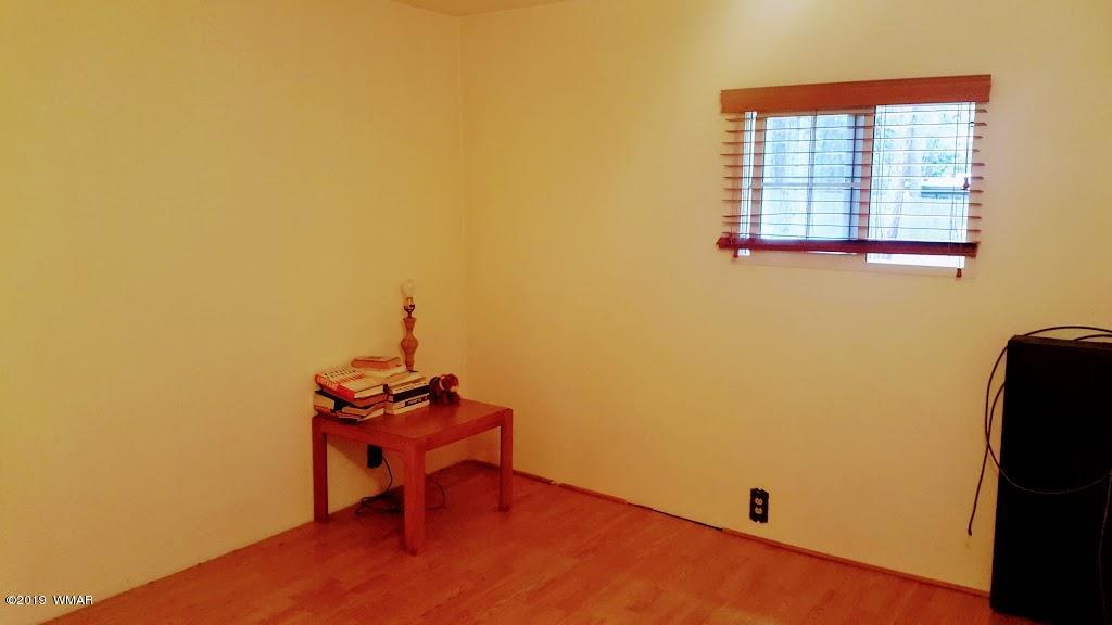4381 East Blue Ridge Loop, Unit 3 Pinetop, AZ 85935 - Photo 14 of 16 a small room with a window