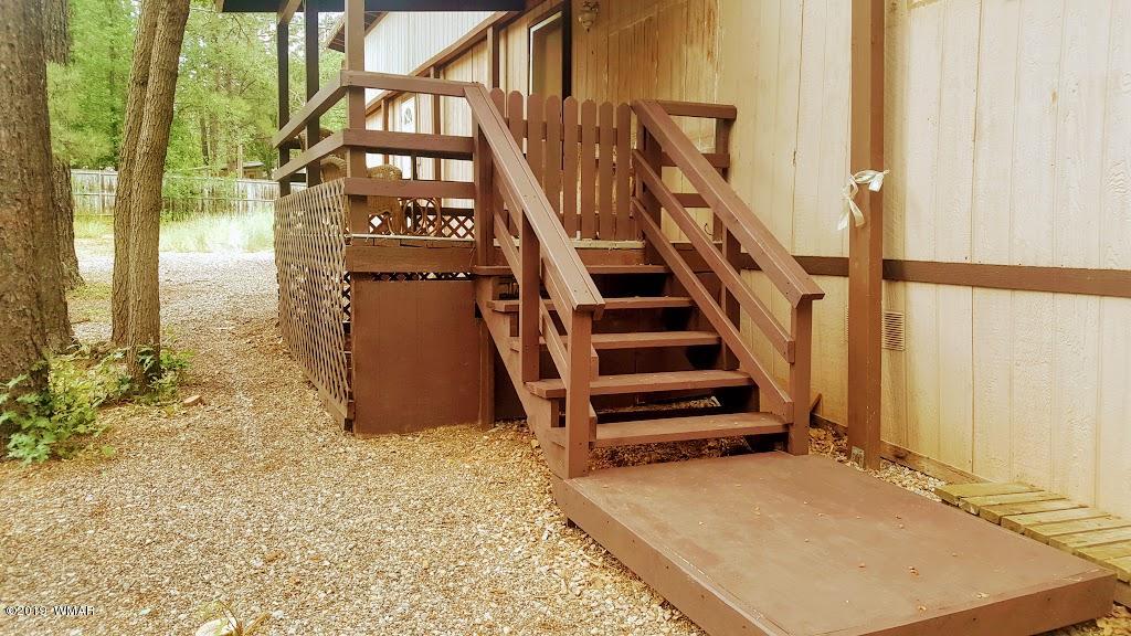 4381 East Blue Ridge Loop, Unit 3 Pinetop, AZ 85935 - Photo 7 of 16 a view of an entryway with wooden floor
