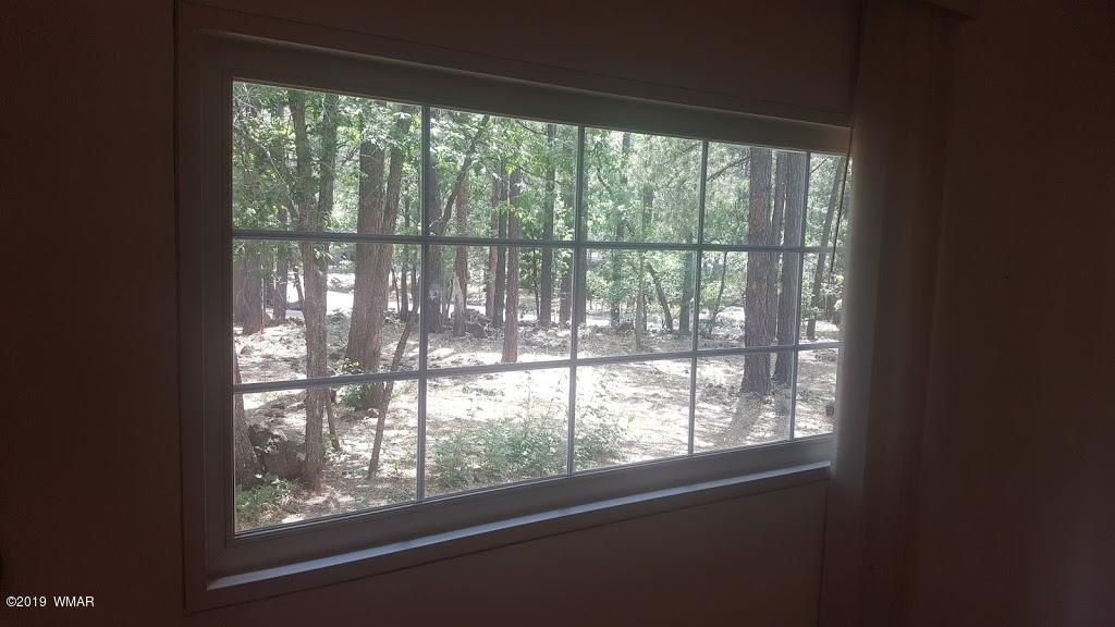 4381 East Blue Ridge Loop, Unit 3 Pinetop, AZ 85935 - Photo 10 of 16 a view of a room with a large window