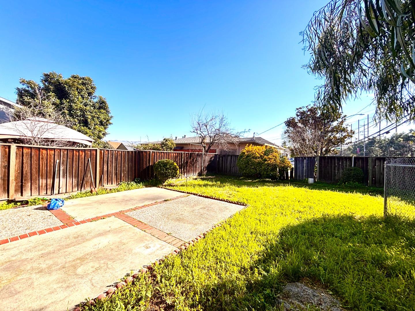 1752 Duffy Way San Jose, CA 95116 - Photo 14 of 14 a view of a swimming pool with a yard