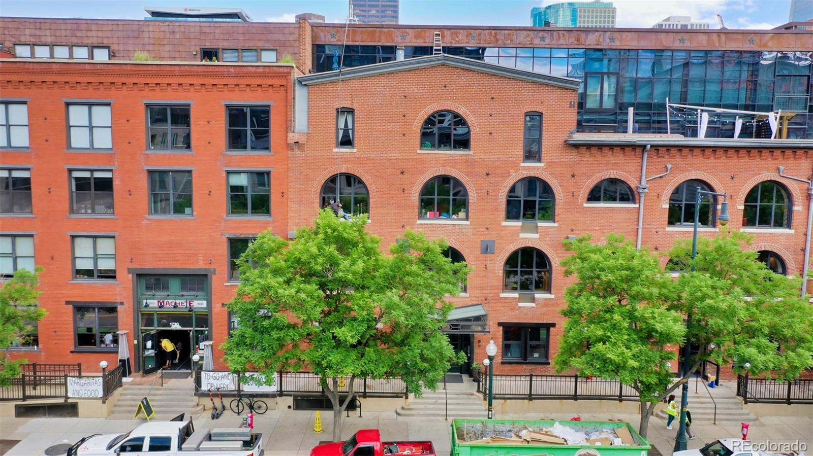 a front view of a building with garden