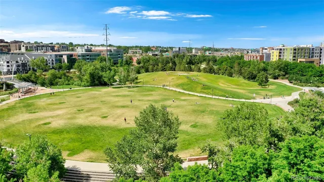 a view of a swimming pool with a yard