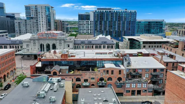a view of city with tall buildings