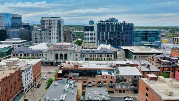 a view of multiple houses with outdoor space