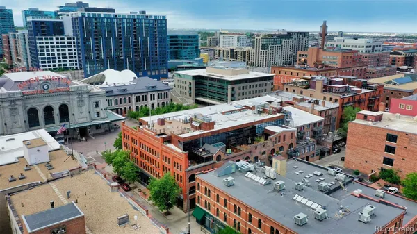 a front view of a building with garden