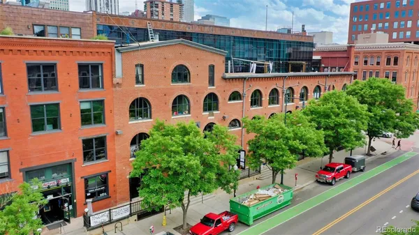 a tall building sitting next to a street