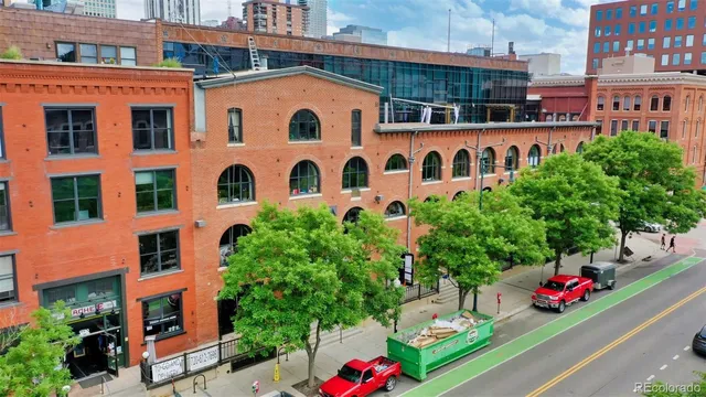 a tall building sitting next to a street