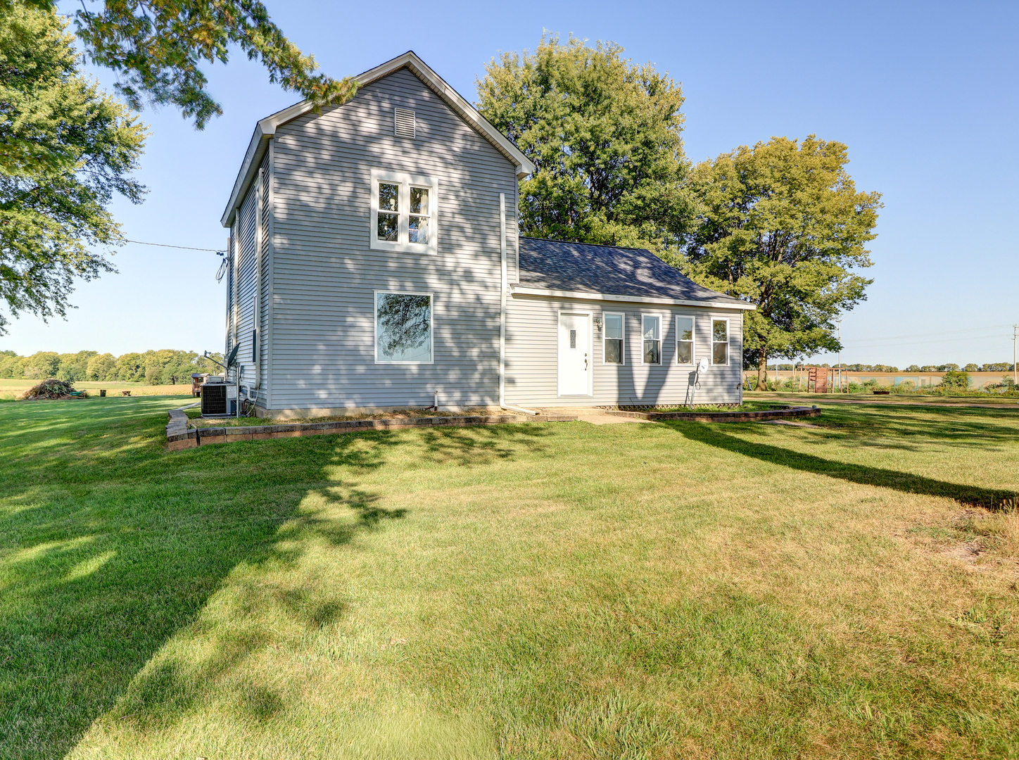 a view of a house with a garden