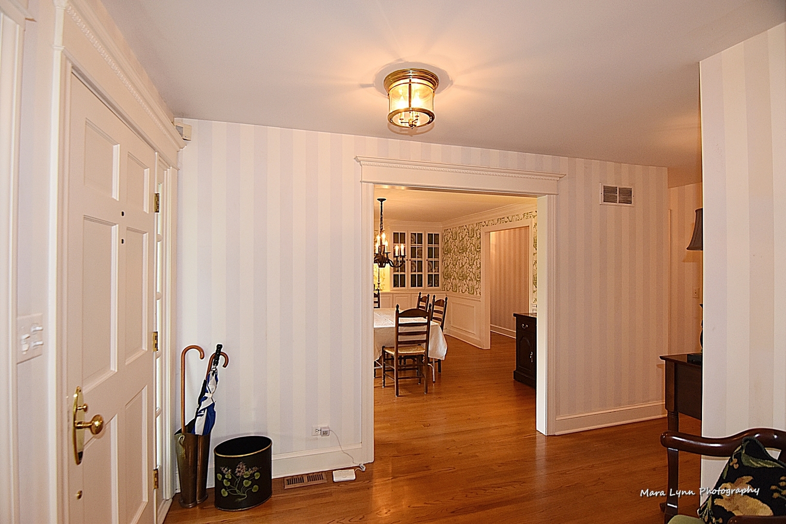 33W981 Army Trail Road Wayne, IL 60184 - Photo 5 of 71 a view of a hallway with furniture and a window