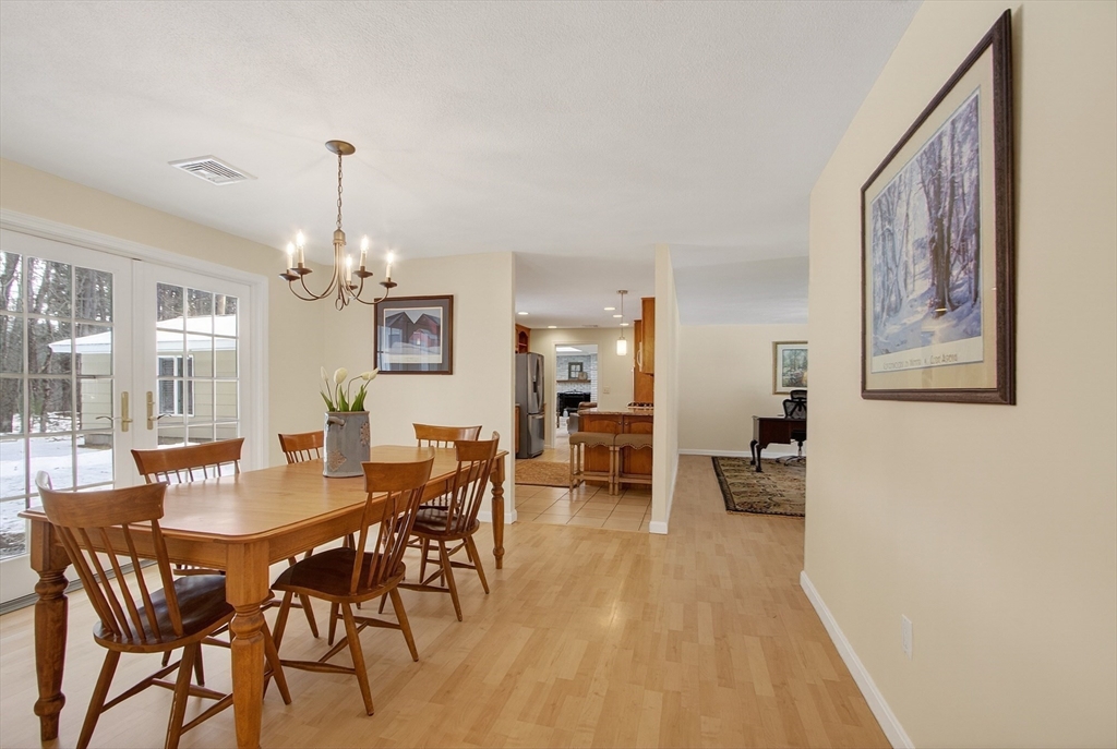 11 Smoke Rise Drive Chelmsford, MA 01824 - Photo 11 of 28 a view of a dining room with furniture