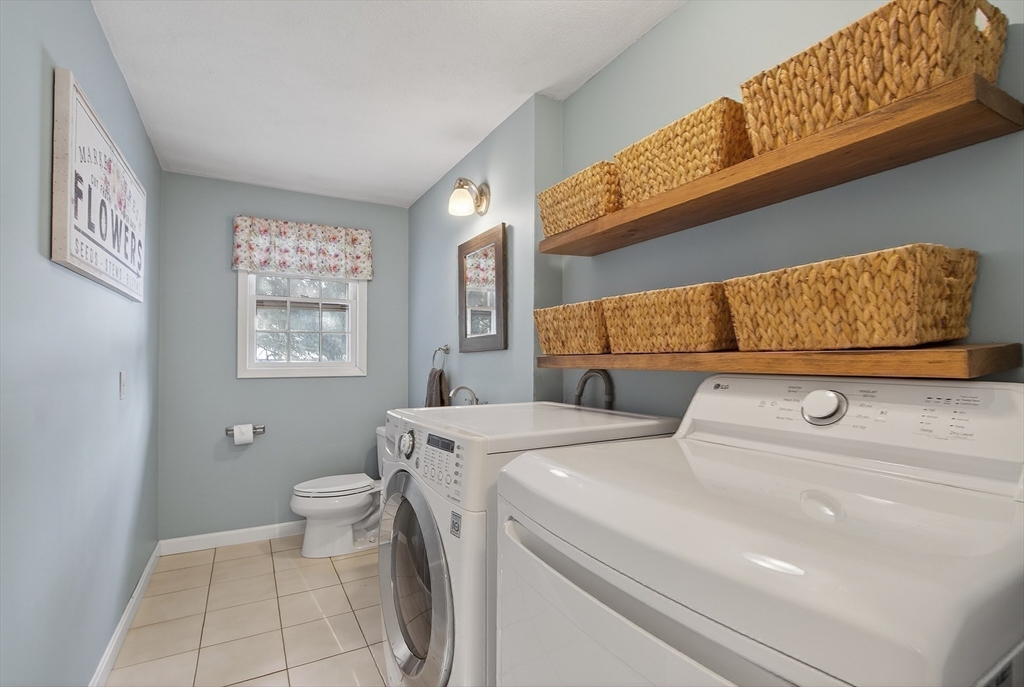 11 Smoke Rise Drive Chelmsford, MA 01824 - Photo 17 of 28 a utility room with dryer and washer