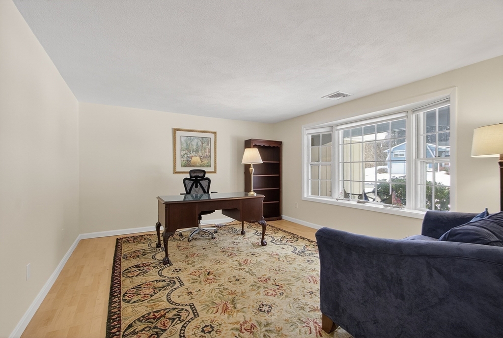 11 Smoke Rise Drive Chelmsford, MA 01824 - Photo 4 of 28 a living room with furniture and a window
