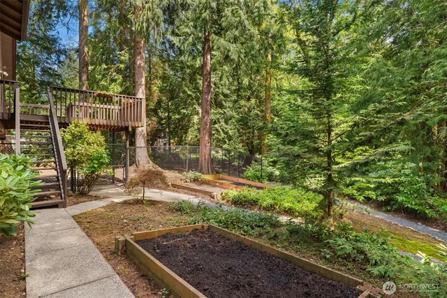 a backyard of a house with lots of green space
