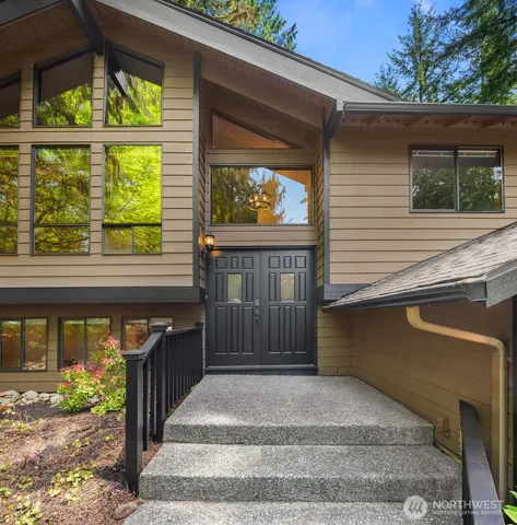 a front view of a house with a porch
