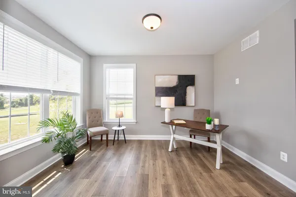 a kitchen with stainless steel appliances a refrigerator sink and cabinets
