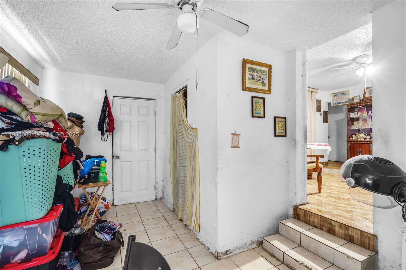 191 Northwest 83rd Street Miami, FL 33150 - Photo 12 of 35 a view of a bedroom with baby toys