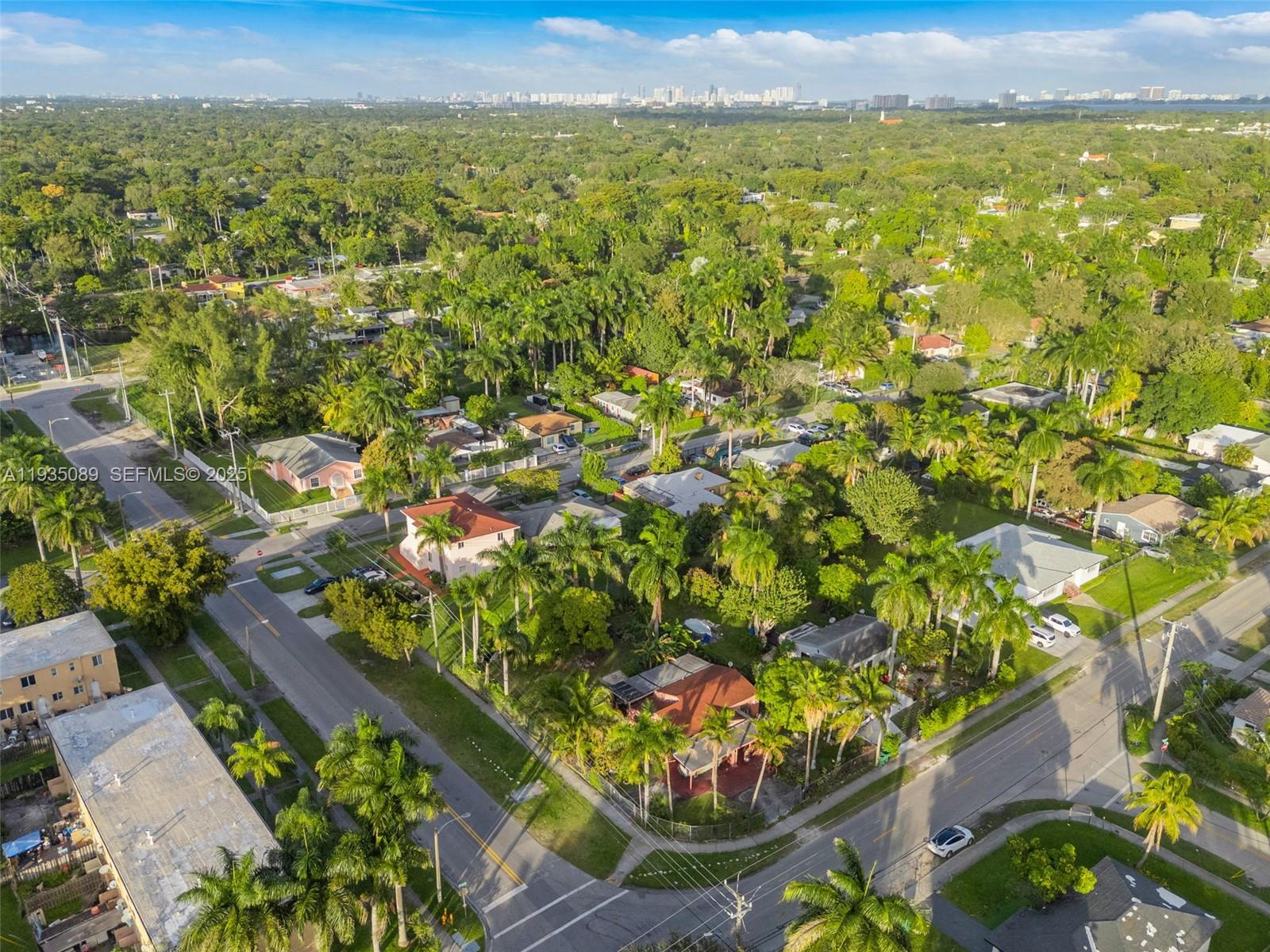 191 Northwest 83rd Street Miami, FL 33150 - Photo 27 of 35 an aerial view of residential houses with outdoor space and trees