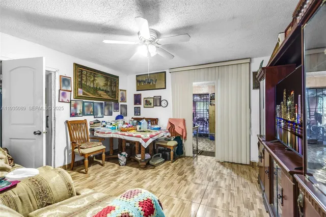 a bed room with a bed and a book shelf
