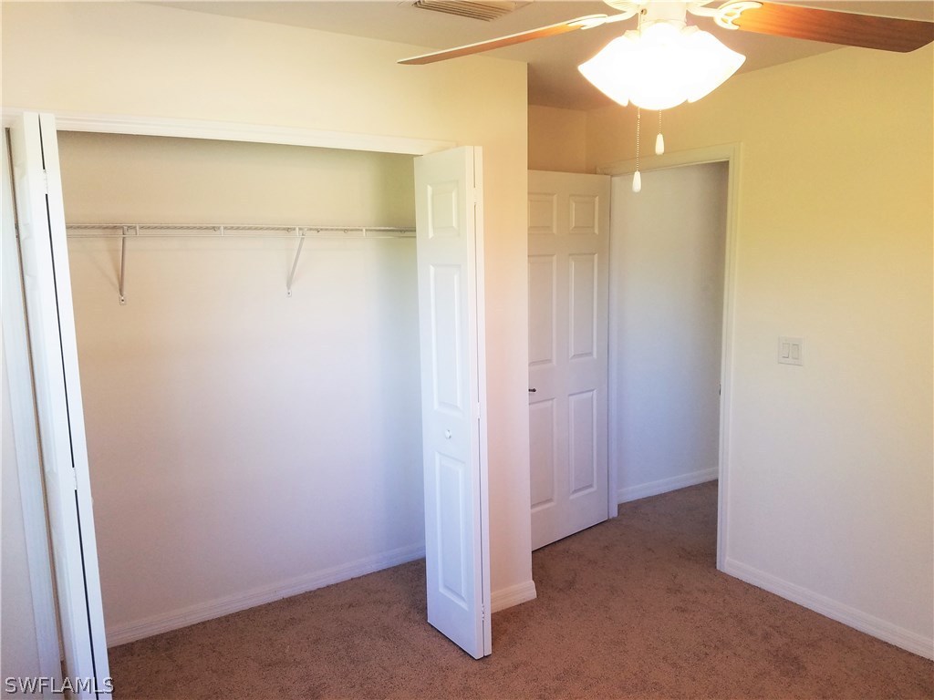 2910 25th Street West Lehigh Acres, FL 33971 - Photo 3 of 15 a view of an empty room