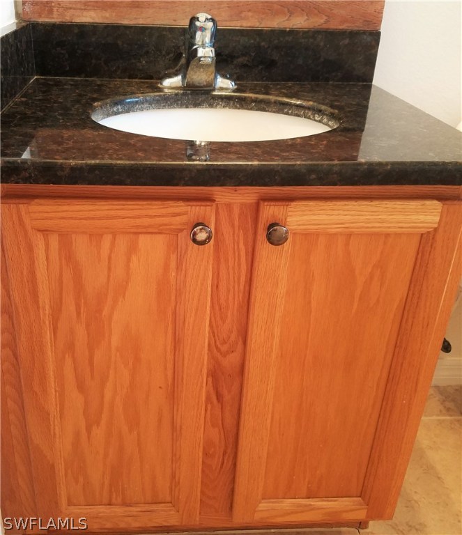 2910 25th Street West Lehigh Acres, FL 33971 - Photo 4 of 15 a close view of sink and cabinets