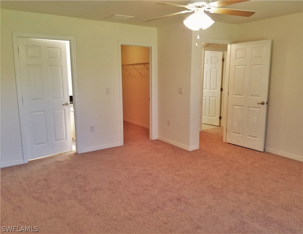 2910 25th Street West Lehigh Acres, FL 33971 - Photo 8 of 15 an empty room with a bathroom