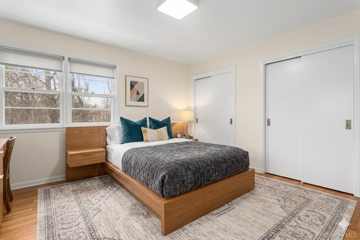 20 Old Farm Road Scarsdale, NY 10583 - Photo 20 of 27 a spacious bedroom with a bed and a window