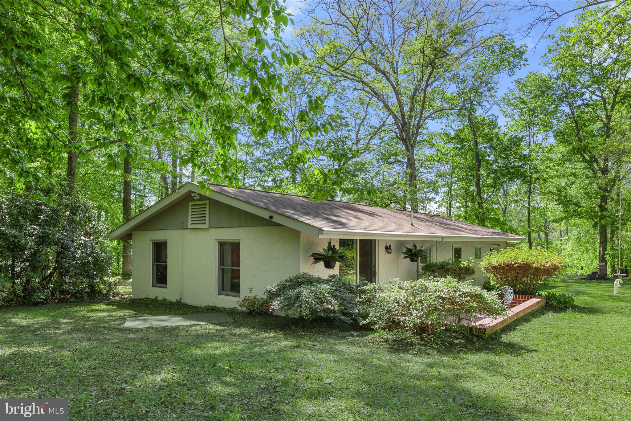 251 Rings End Road Millington, MD 21651 - Photo 33 of 47 a front view of a house with a garden