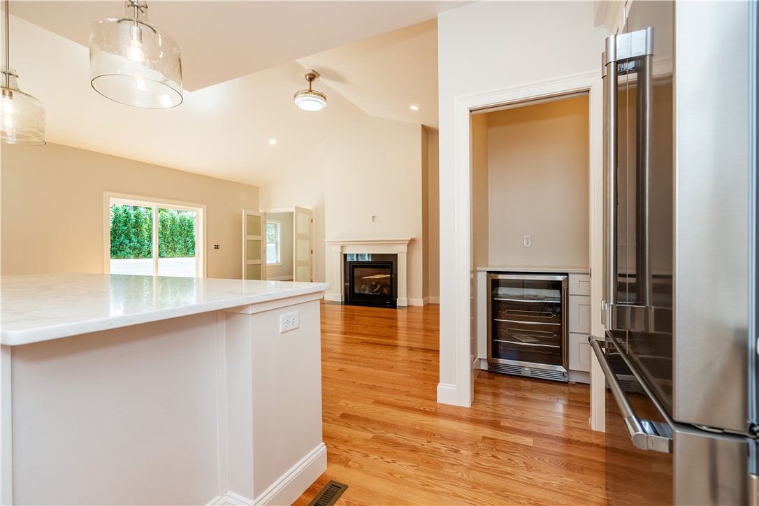 19 Hampton Road, Unit 69 Coventry, RI 02816 - Photo 25 of 49 Peek into the Butlers Pantry with wine fridge.
Photos of similar models