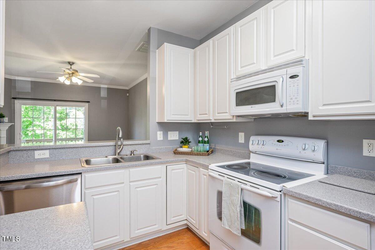 7616 Satinwing Lane Raleigh, NC 27617 - Photo 4 of 25 06-3
