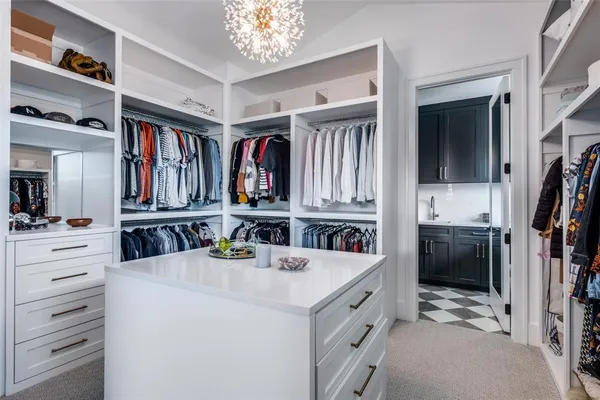 a bathroom with a sink a vanity and a mirror