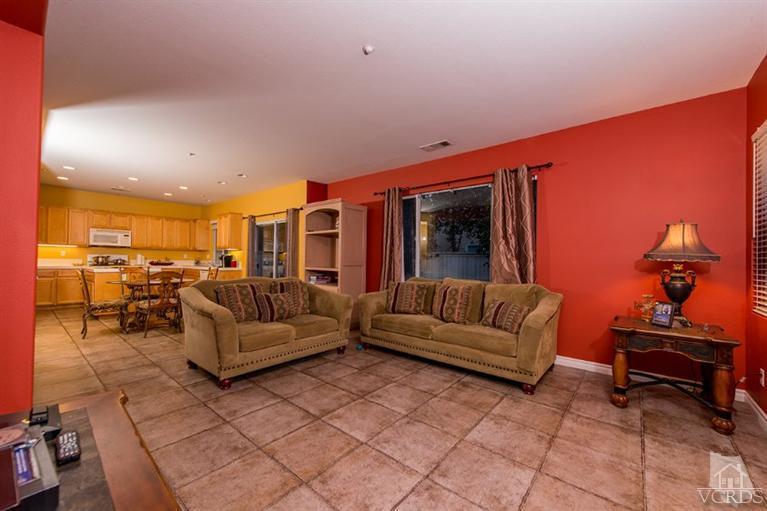 1892 Ribera Drive Oxnard, CA 93030 - Photo 11 of 34 a living room with furniture and a piano