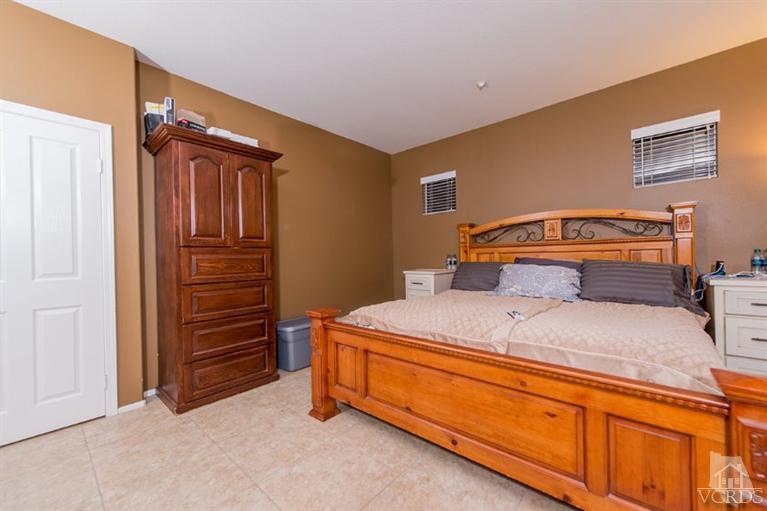 1892 Ribera Drive Oxnard, CA 93030 - Photo 29 of 34 a bedroom with a bed and a dresser